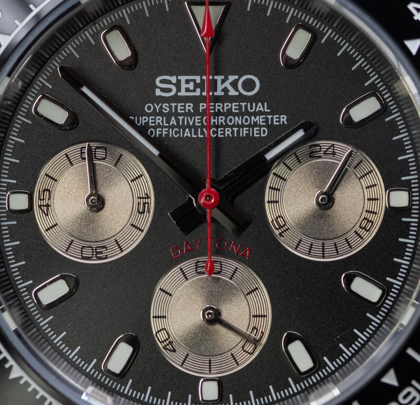 Seiko homage Daytona with a black dial and moonrock sub dials. RED HAND EDITION