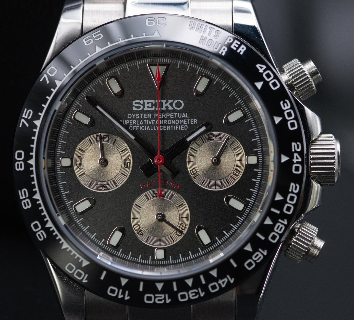 Seiko homage Daytona with a black dial and moonrock sub dials. RED HAND EDITION